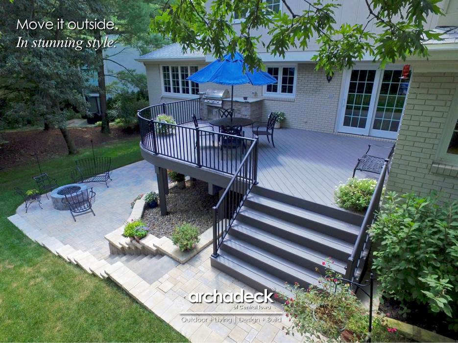 A deck with a patio and a table

AI-generated content may be incorrect.